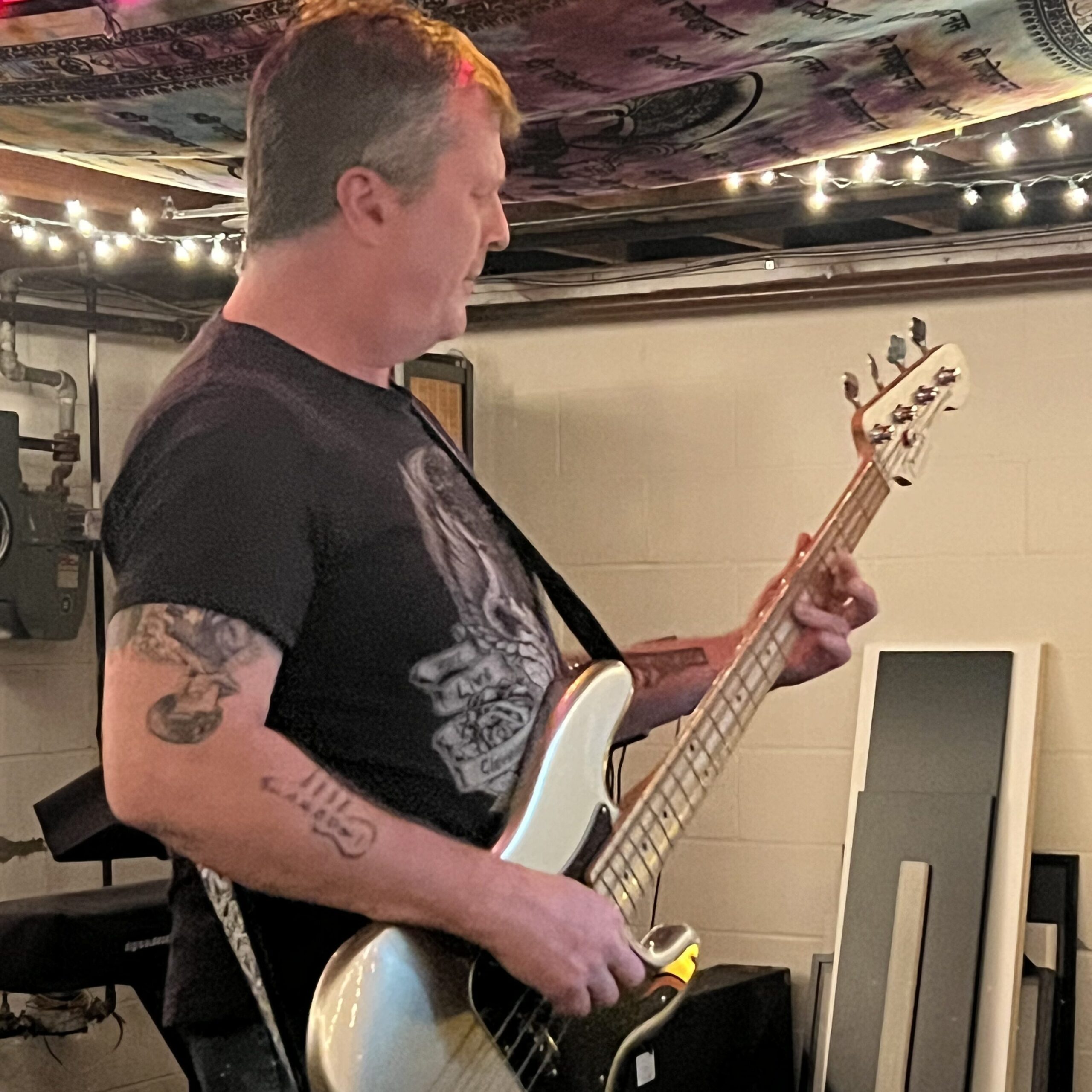 Marc Bachorik shown playing bass during a Shadow Estate rehearsal.